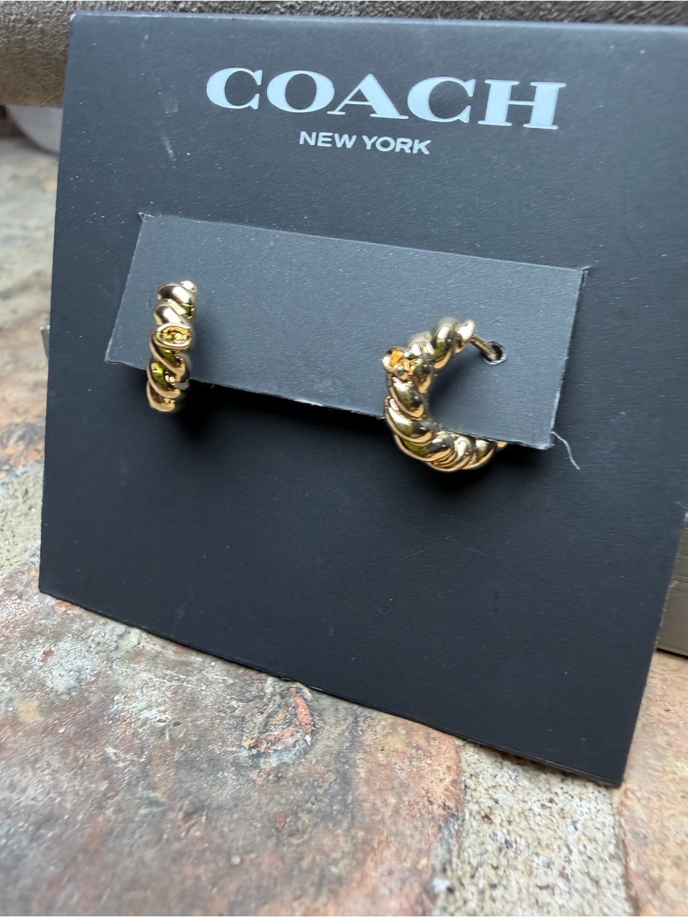 COACH Gold Twisted C Huggie Hopp Earrings - Picture 3 of 5